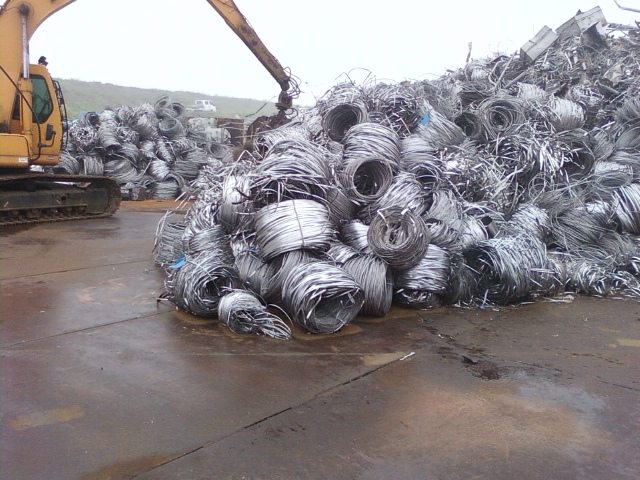 Coiled special alloy scrap at an industrial yard